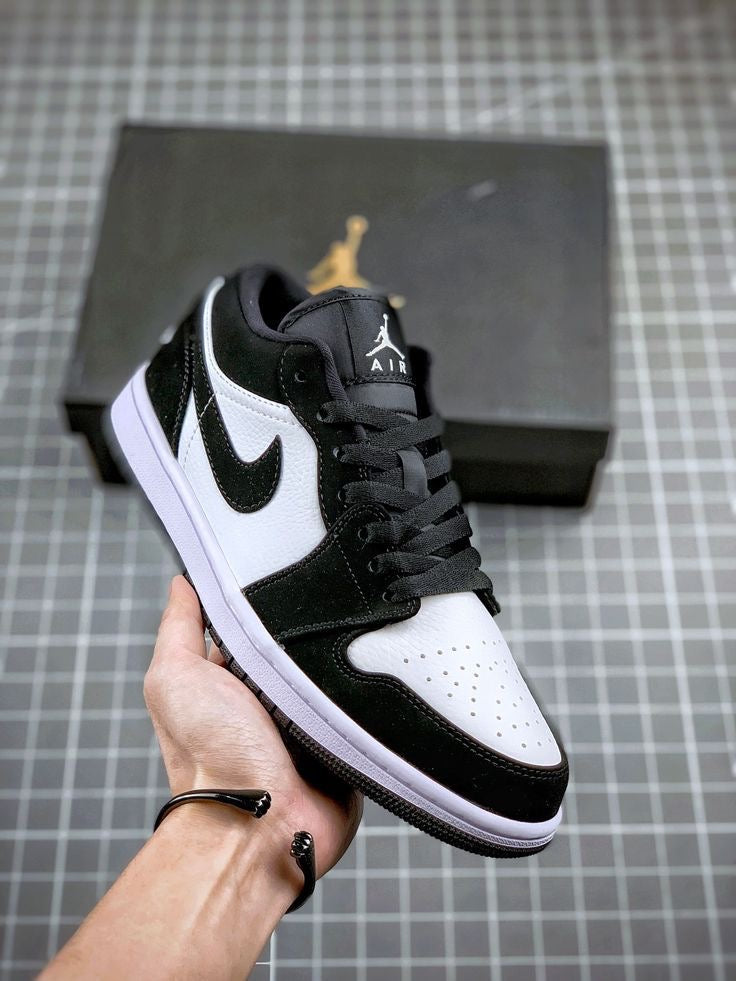 JORDAN RETRO 1 LOW BLANCO - NEGRO