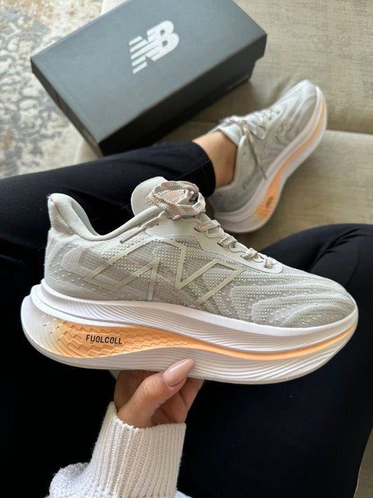 NEW BALANCE FUELCELL GRIS / ROSA
