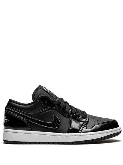 JORDAN RETRO 1 LOW CHAROL NEGRO / BLANCO