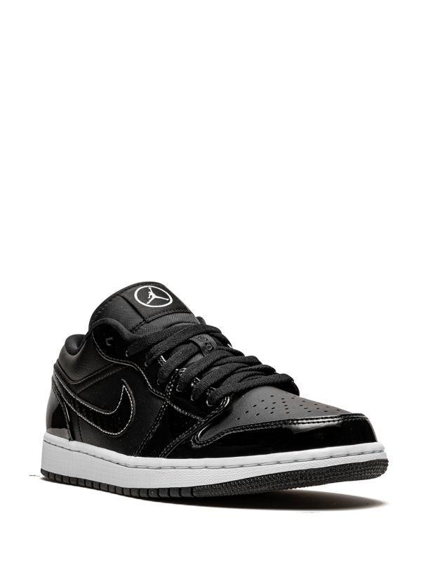 JORDAN RETRO 1 LOW CHAROL NEGRO / BLANCO