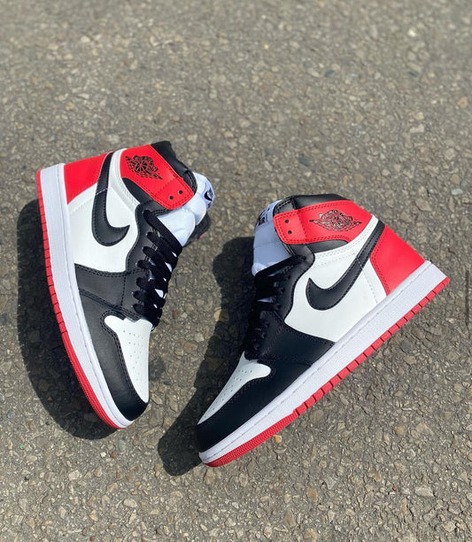 JORDAN RETRO 1 BLANCA - ROJA
