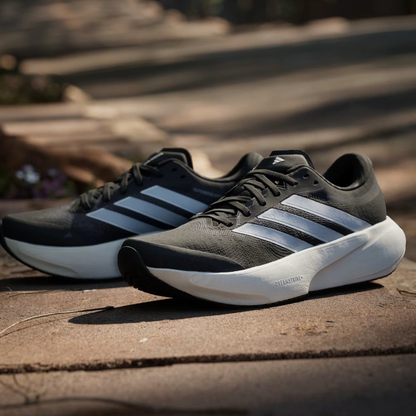 ADIDAS ADIZERO SUPERNOVA NEGRO / BLANCO